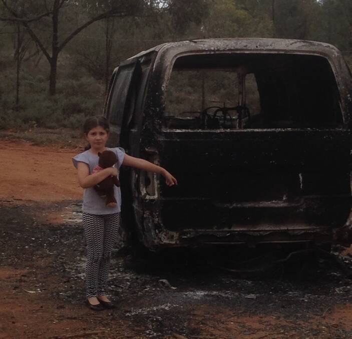 CRIME WAVE: Anthony Ferraro's daughter Elizabeth was shattered when she saw their burnt out van. Businesses will face costs beyond the thefts. Picture: Supplied