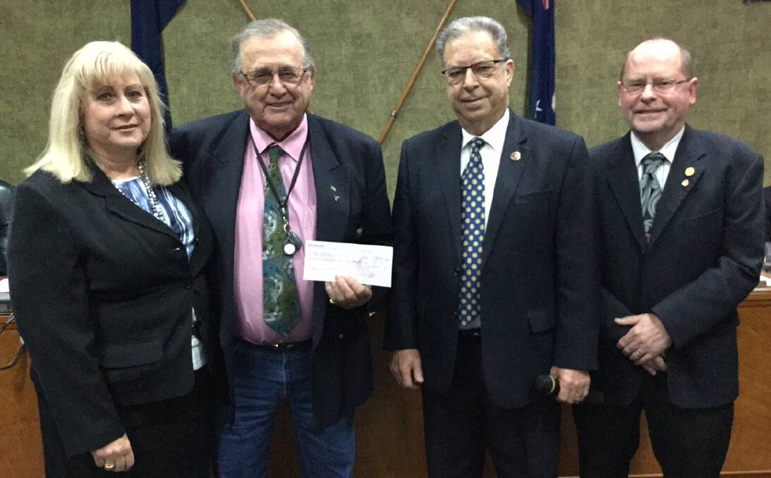 PRESENTATION: Councillors Anne Napoli and John Dal Broi with Sam Catanzariti and Greg Murphy from Griffith Rotary Club and the $100,000 cheque. Picture: Supplied.