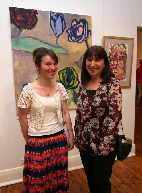 Sixteen-year-old Chelsea with her mother Carmela Koztowski admiring the art.