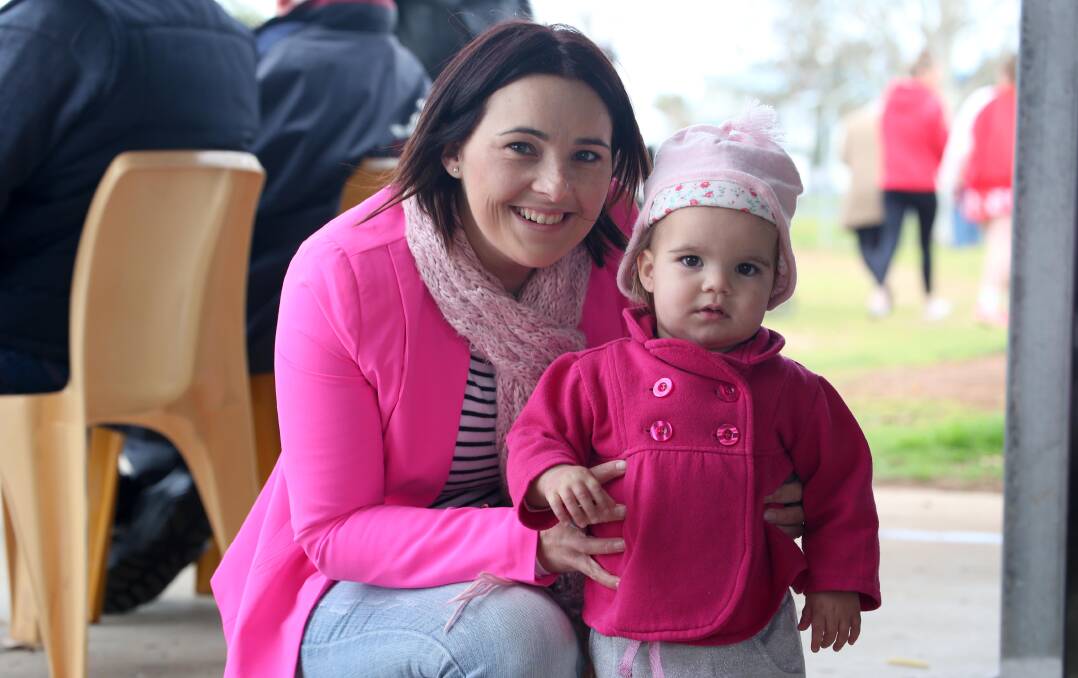 Chloe Catanzariti with her daughter Sierra, 18 months, wearing their colours proudly.