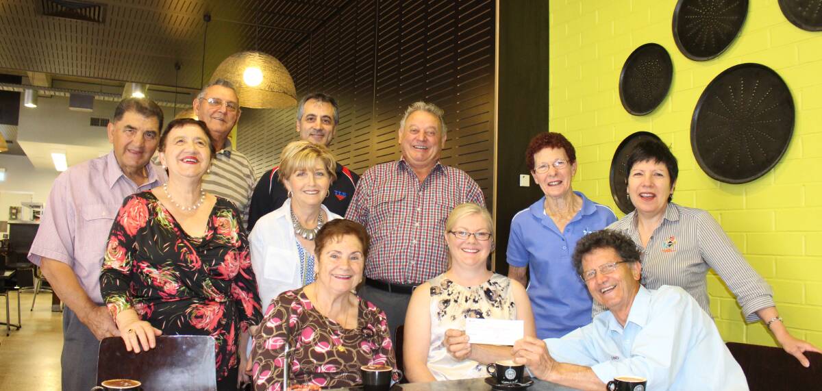 GIVING BACK: Griffith Abruzzo Association presenting a cheque for $4000 to Michelle Vearing from the MND support Ggroup. Picture: Stephen Mudd.
