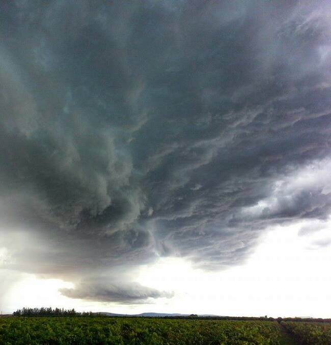 STORM: This photo of storm clouds just before the hail hit Yoogali was sent in via Facebook. Send your pictures to editor@areanews.com.au