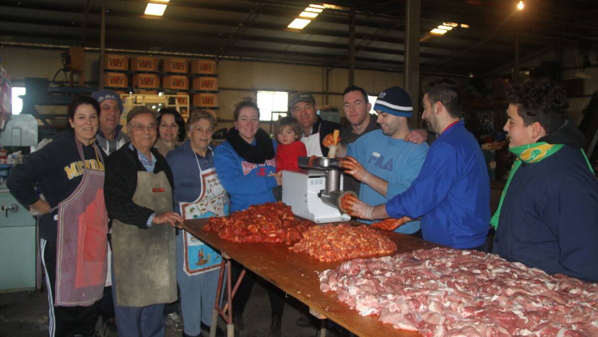 FAMILY VALUES: The Schirripa family making their salami. Picture: Stephen Mudd.