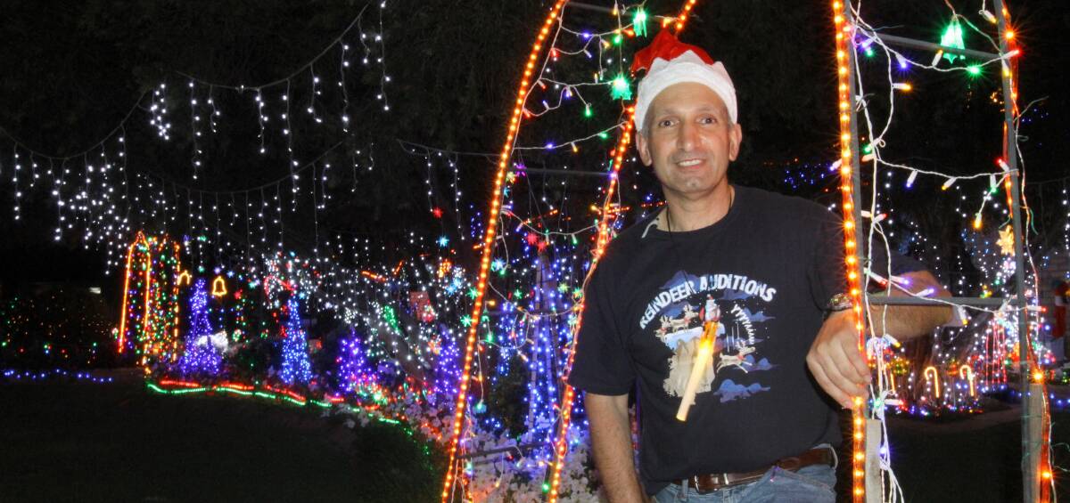 LIGHT SHOW: Roy Marando has been building impressive Christmas light displays for 11 years. Picture: Anthony Stipo.