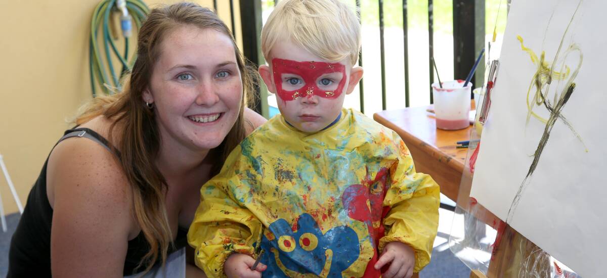 FUN: Ashley Bourke-Sands with two-year-old Hunter Nichols at the open day on Saturday. Picture: Anthony Stipo.