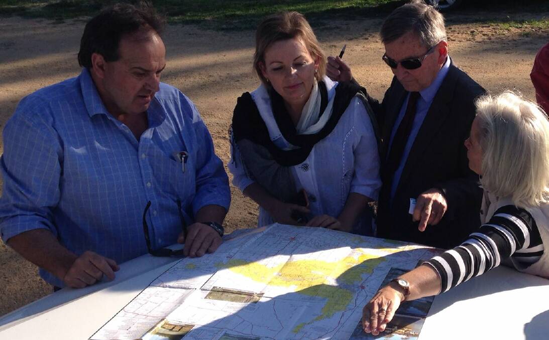 AUDIT: George Warne and Neil Andrew from the Murray-Darling Basin Authority with Sussan Ley and landholder Louise Burge assessing the impact of the basin plan. Picture: Supplied.