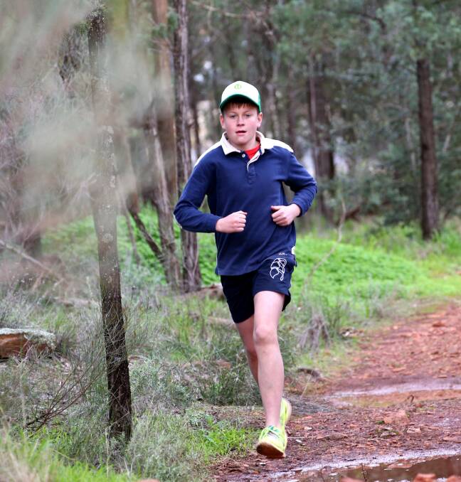 JOGGERS: Lachlan West enjoys the great outdoors and a pair of running shoes. Send your pictures to editor@areanews.com.au