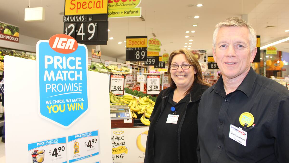 PROMISE: Kester Delamay and Michael Marchant from Ritchies Supa IGA at Griffith Central. Picture: Stephen Mudd.