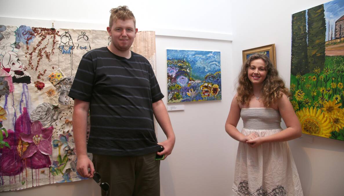 David Nicholls shows off his artwork to his sister Kate.