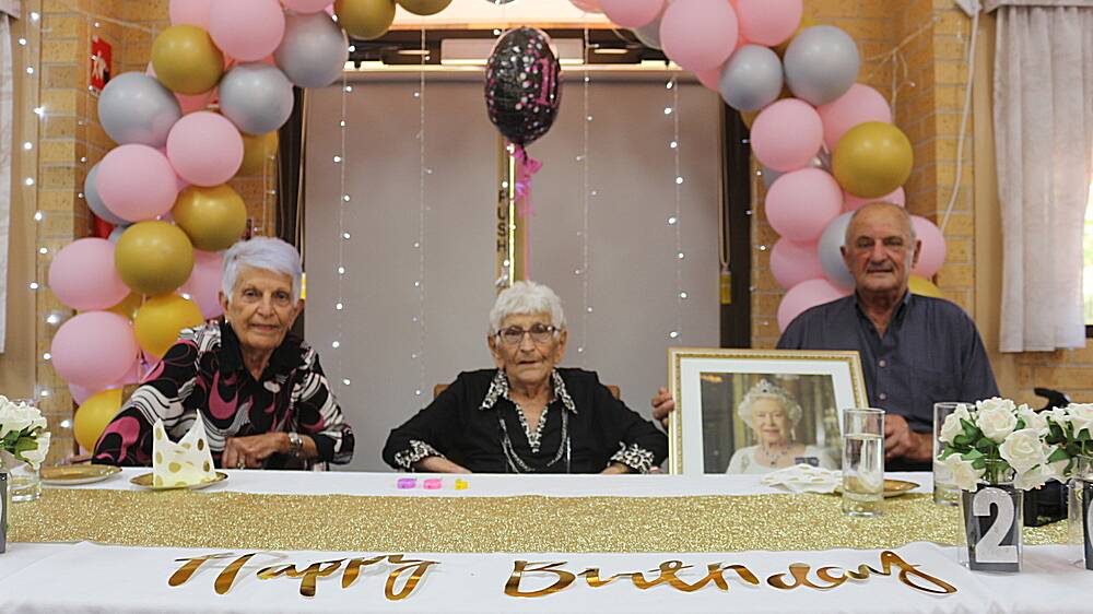 MILESTONE: Bruna Pietroboni (centre) celebrated her 100th birthday at Scalabrini Lodge on March 23 alongside her daughter Mary Virago and Mary's husband Angelo Virago. PHOTO: Calhan Behrendt