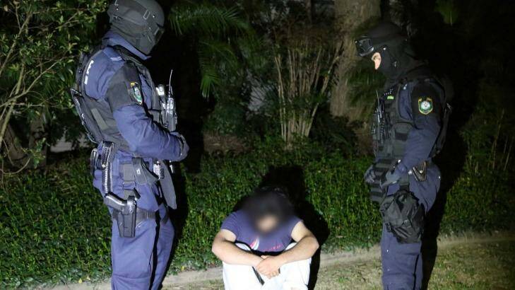 Fifteen people have been arrested and one charged in counter-terrorism raids in Sydney and Brisbane. Photo: NSW Police Media