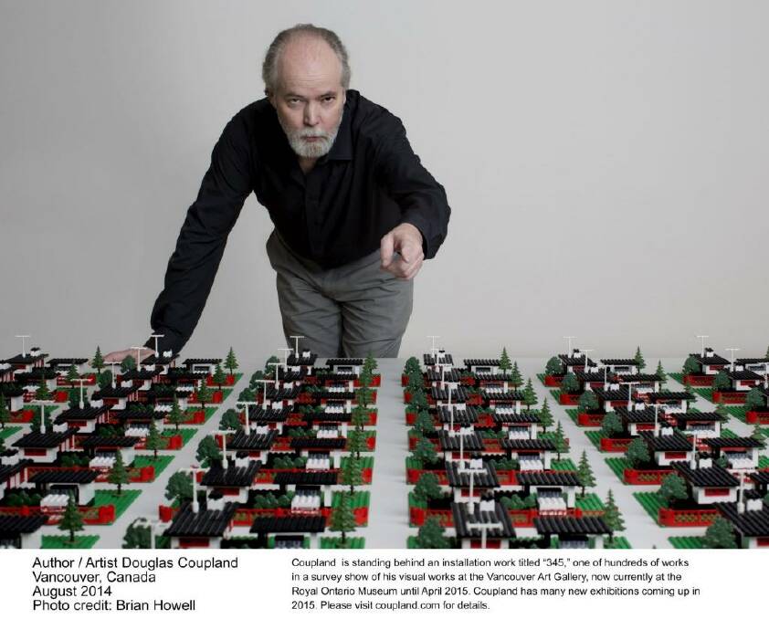 Douglas Coupland with a work from his survey art exhibition in Vancouver, "Everywhere is Anywhere is Anything is Everything". 
 Photo: Brian Howell