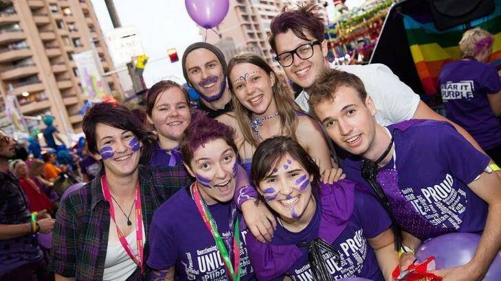 Students, police and the public celebrate Wear it Purple day in Sydney on Friday.  Photo: Wear It Purple