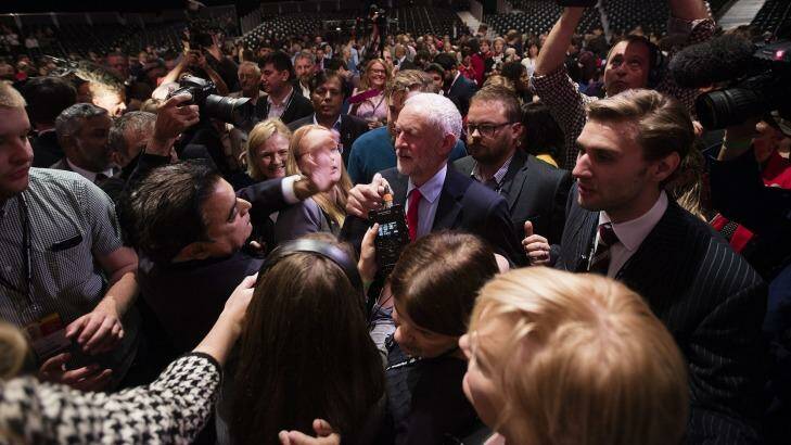 Jeremy Corbyn, leader of the U.K. opposition Labour Party, center, is surrounded by members of the media. Photo: Simon Dawson