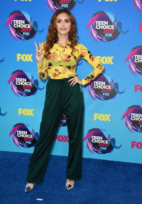Alyson Stoner arrives at the Teen Choice Awards at the Galen Center on Sunday, Aug. 13, 2017, in Los Angeles. (Photo by Jordan Strauss/Invision/AP)