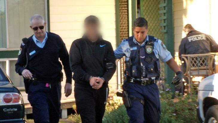 A man is arrested after a series of drug raids in Sydney and Port Stephens. Photo: NSW Police