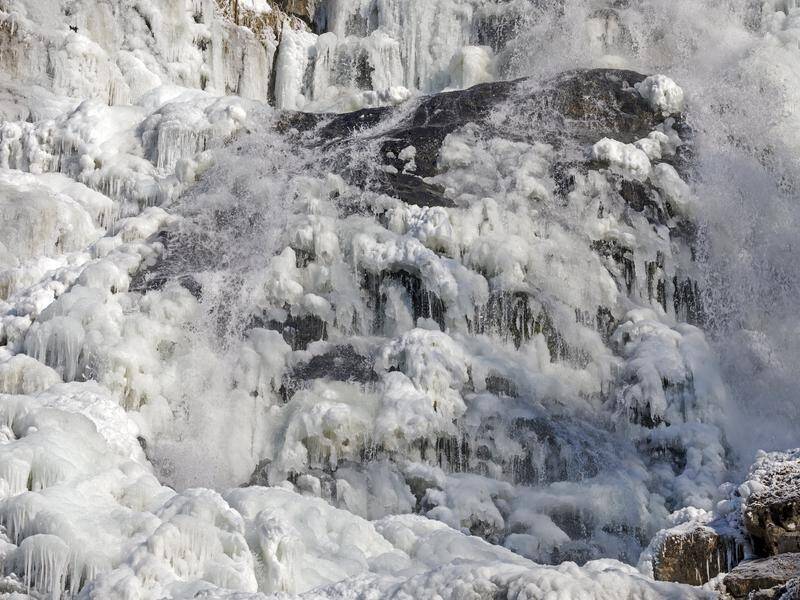 Sub-zero temperatures have caused a waterfall in Germany's Black Forest to freeze over.