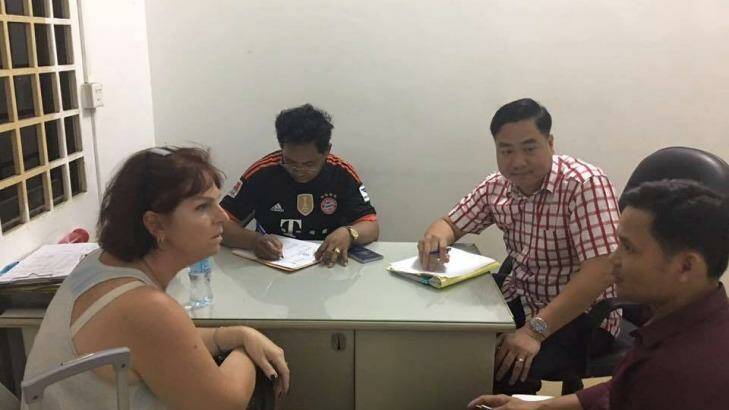 Australian nurse Tammy Davis-Charles is questioned by Cambodian police. Photo: Cambodian National Police