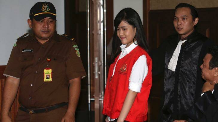 Murder charge: Jessica Kumala Wongso enters the Central Jakarta District Court in Indonesia. Photo: TATAN SYUFLANA