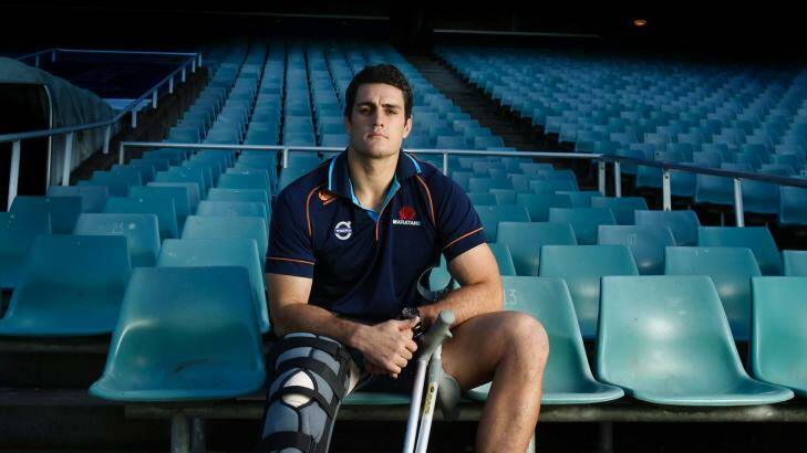 SITTING IT OUT: Injury has robbed Waratahs captain Dave Dennis the chance to lead his team to a Super Rugby final. Photo: Louise Kennerley