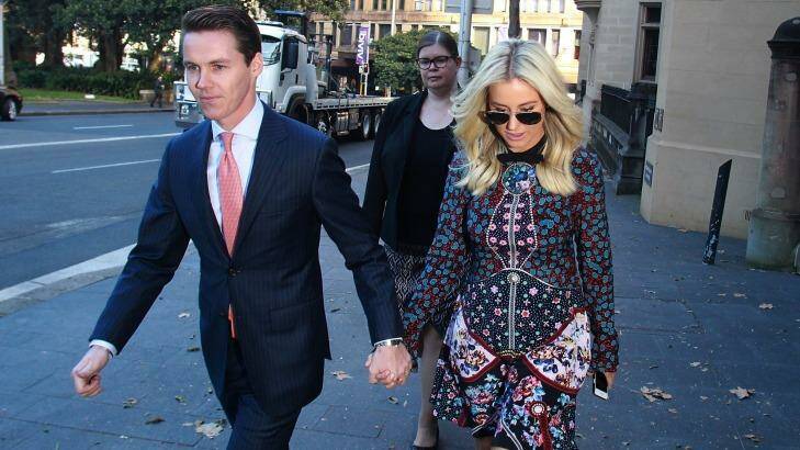 Oliver Curtis and wife Roxy Jacenko arrive at St James Supreme Court on Tuesday. Photo: Ben Rushton