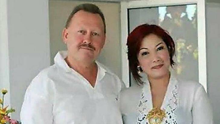 Killed in Bali: Robert Kelvin Ellis, pictured with his wife Julaikah Noor Aini, was found with his throat slashed.  Photo: Supplied