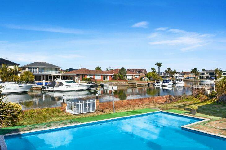 PR Image:
94 BELGRAVE ESP SYLVANIA WATERS
Buy, renovate and Build the Dream right here!
Boasting a premium waterfront address this quietly positioned property is highly desirable which offers a wide deep water frontage and loads of future potential to capitalise. Existing home is a retro style 2 level brick residence with architectural appeal back in its day boasting high vaulted ceilings formal and casual living spaces offering loads of natural light throughout. A fantastic opportunity to renovate this sound home  with good bones or feasibility has been done by agent/builder  to build new 2 level contemporary home by Huxley Homes without fuss. 

- Wide 57 feet frontage to sea canal 
- Original clean home with character & great potential 
- Expansive casual and formal sunlit living areas
- Generous sized 3 bedrooms, walk in & built in robes
- Ensuite to master bedroom plus main bathroom, 3 Wcs 
- Level yard with big pool and access to floating pontoon  
- Garage with internal access and under cover for 2 cars  
- Large land area of approx 670 sqm allows for large residence
- Close Southgate Shopping centre, transport schools 
- No mooring fees 24-7  privately owned unique waterway