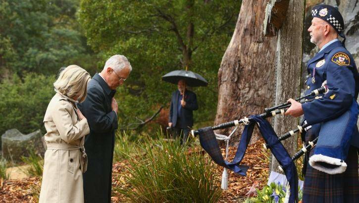 Malcolm Turnbull and his wife Lucy Turnbull lay a wreath during the 20th anniversary commemoration service of the Port Arthur massacre. Photo: Robert Cianflone/Getty Images