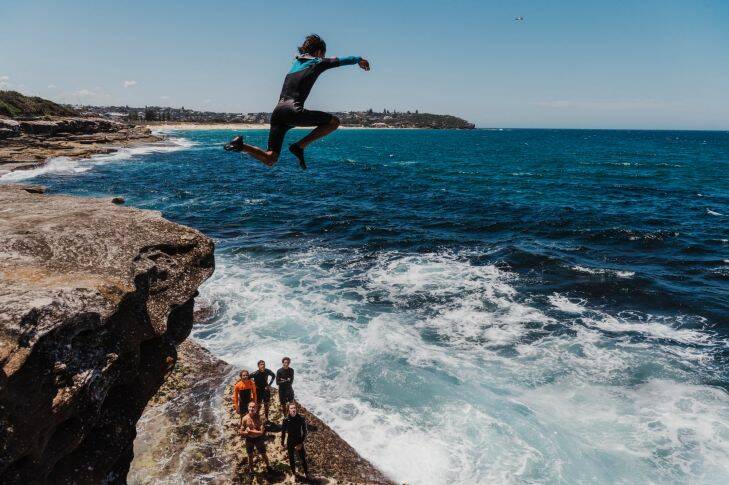 Teenagers enjoy the warm weather at South Curl Curl. Saturday 6th January 2018. Photograph by James Brickwood. SMH NEWS 180106