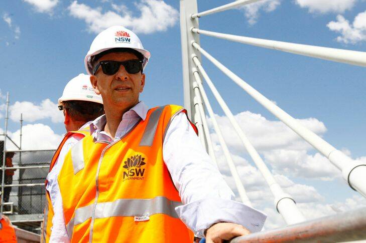 Minister for Transport and Infrastructure, Andrew Constance inspects a construction work, Sydney, Sunday, October 22, 2017. Minister for Transport and Infrastructure Andrew Constance released the Future Transport 2056 draft strategy alongside the release of the Greater Sydney Commission????s draft Greater Sydney Region Plan. Sydney will become three connected cities over the next 40 years under a new plan headed by Lucy Turnbull. (AAP Image/Danny Casey) NO ARCHIVING