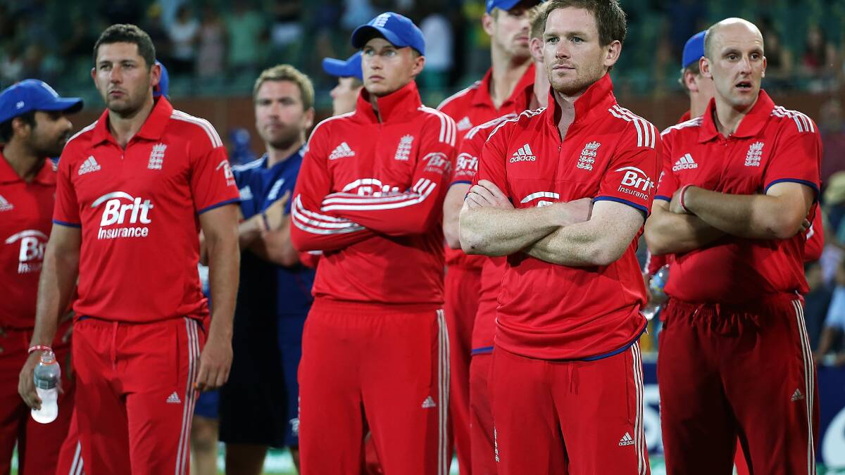 The England players look on during the Australian team celebration after game five of the One Day International Series. Picture: Getty