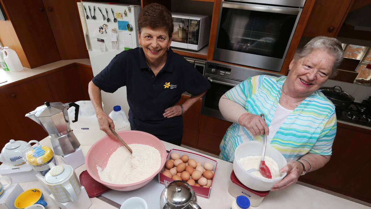 SUPER STIRRERS: Griffith's Biggest Morning Tea organisers Deanna Marriott and Jan Newman prepare for their annual fund-raiser this Friday at the Griffith Ex-Servicemen's Club. Picture: Anthony Stipo
