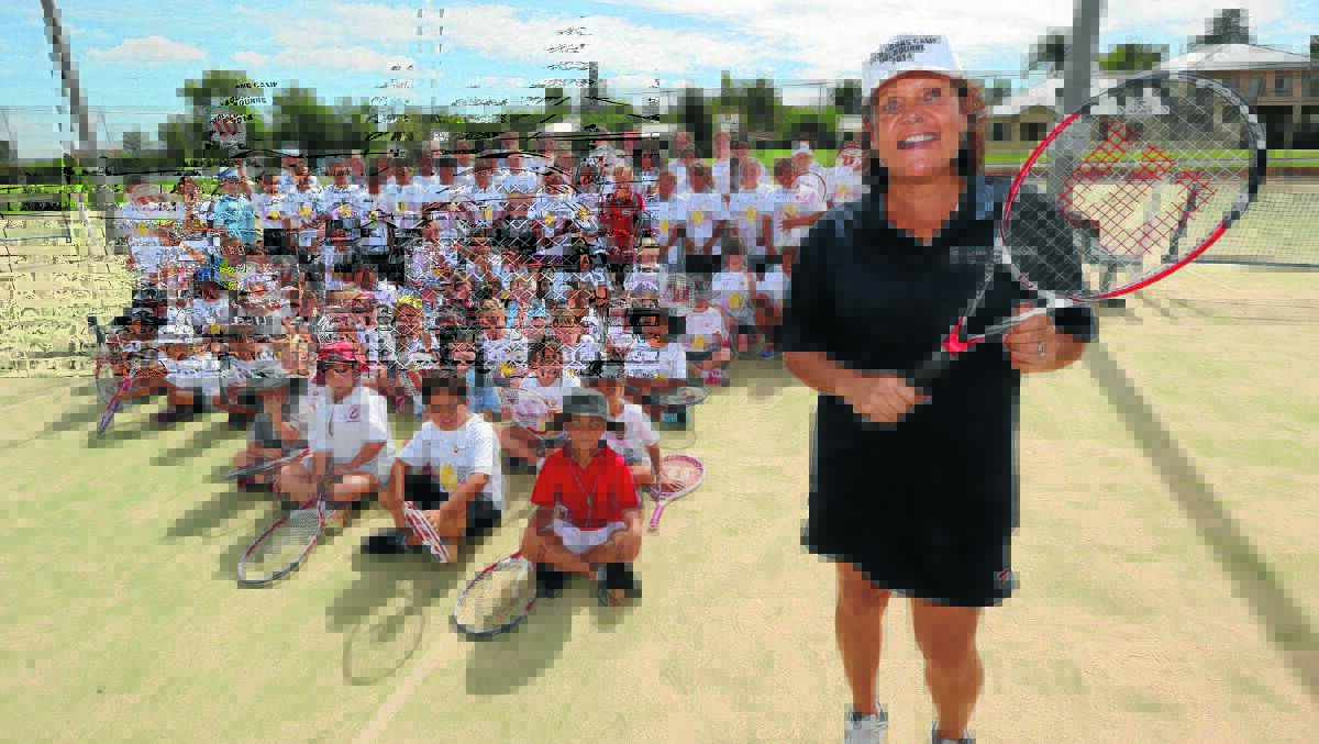 LEGENDARY LESSON: Evonne Goolagong Cawley inspires local Indigenous students in Griffith on Monday at the Jack Shannon Tennis Courts. Picture: Anthony Stipo