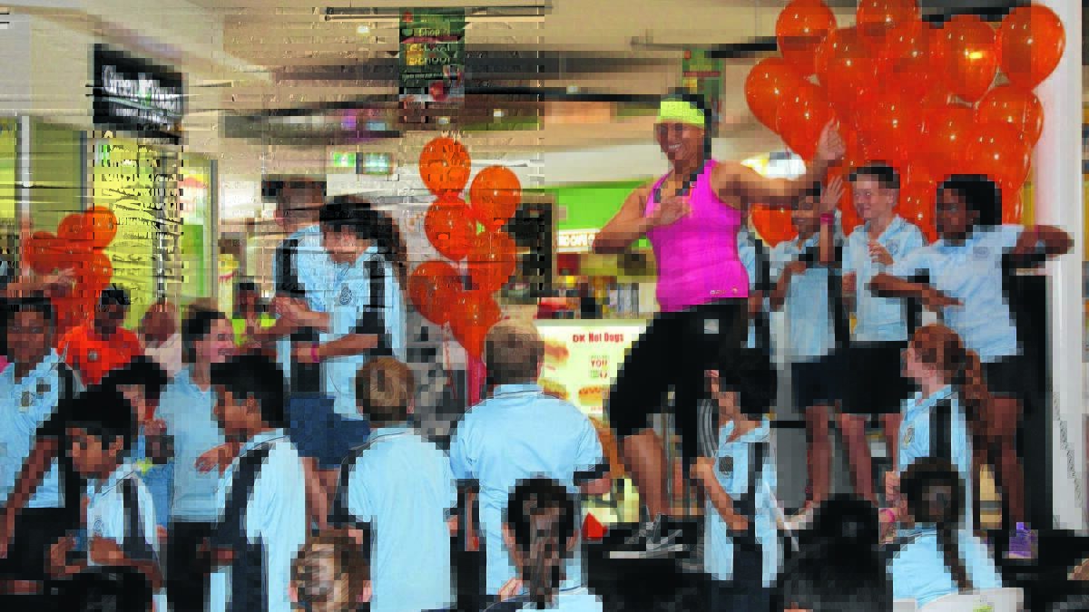 GET MOVING: Rose Rauluni teaches zumba to St Pat’s students. 