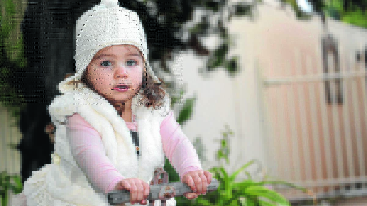 RUGGED UP: Arabella D’Aquino, 23 months, didn’t let the cool weather stop her from playing outside on the weekend. Picture: Anthony Stipo