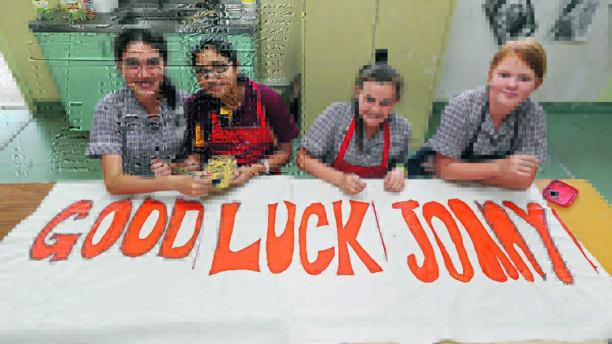GO JOANY: Marian Catholic College year 7 students Jessica Alpen, 12, Tarnpreet Kaur, 12, Ashleigh Hoffmann, 12, and Meg Dal Broi, 12, will be among the many Griffith residents cheering on former student Joany Badenhorst when she competes today in Sochi. 	Picture: Anthony Stipo 