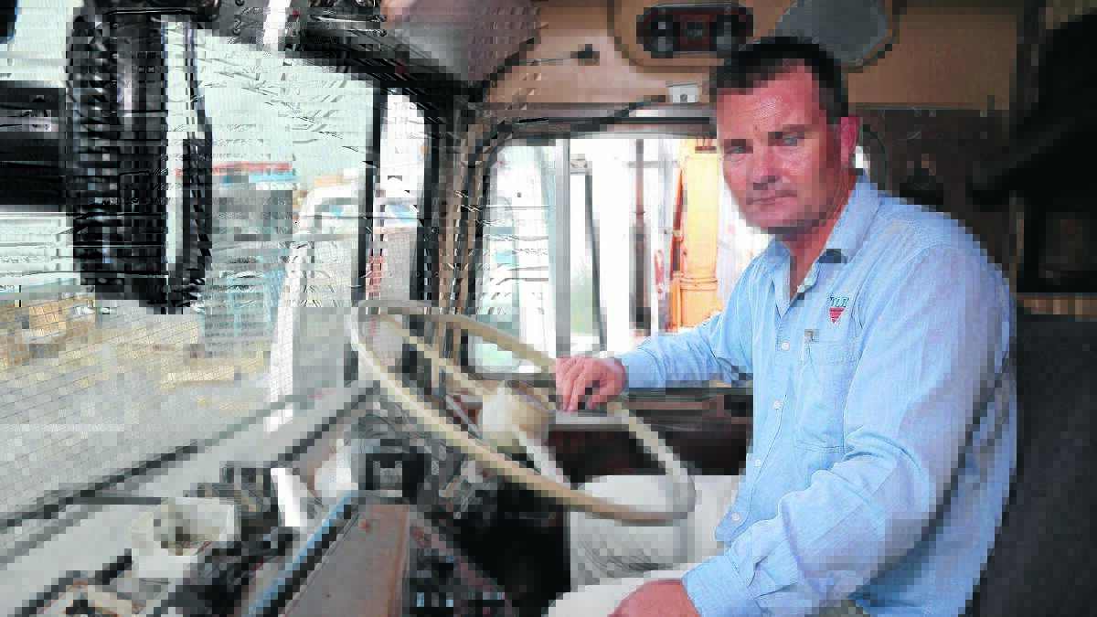 SECOND HAUL: Griffith truckie Brendan Farrell gears up for another hay run to Bourke. 