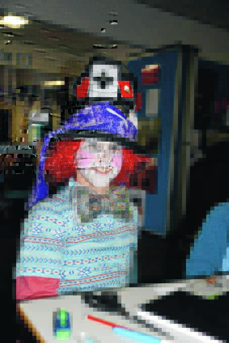 MAD ABOUT READING: Paul Pietroboni dressed to impress as the Mad Hatter for the book fair. Picture: Kym Beltrame