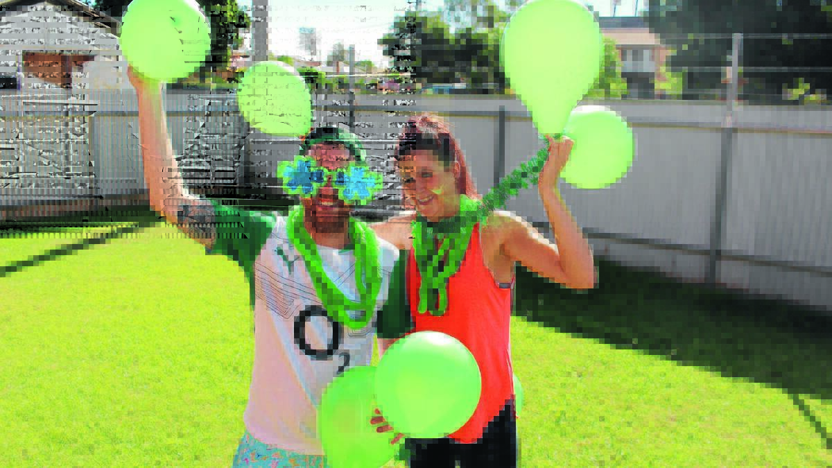 GOING GREEN: Eoin Keohane and Ciara Spillane get in the spirit for St Patrick’s Day. 