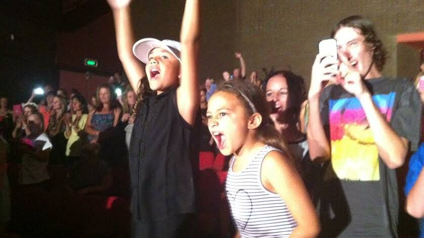 WE HEART REECE: Alana Koro, 9, and Talei Beitaki, 6, screaming with excitement to see Reece Mastin in Griffith. 