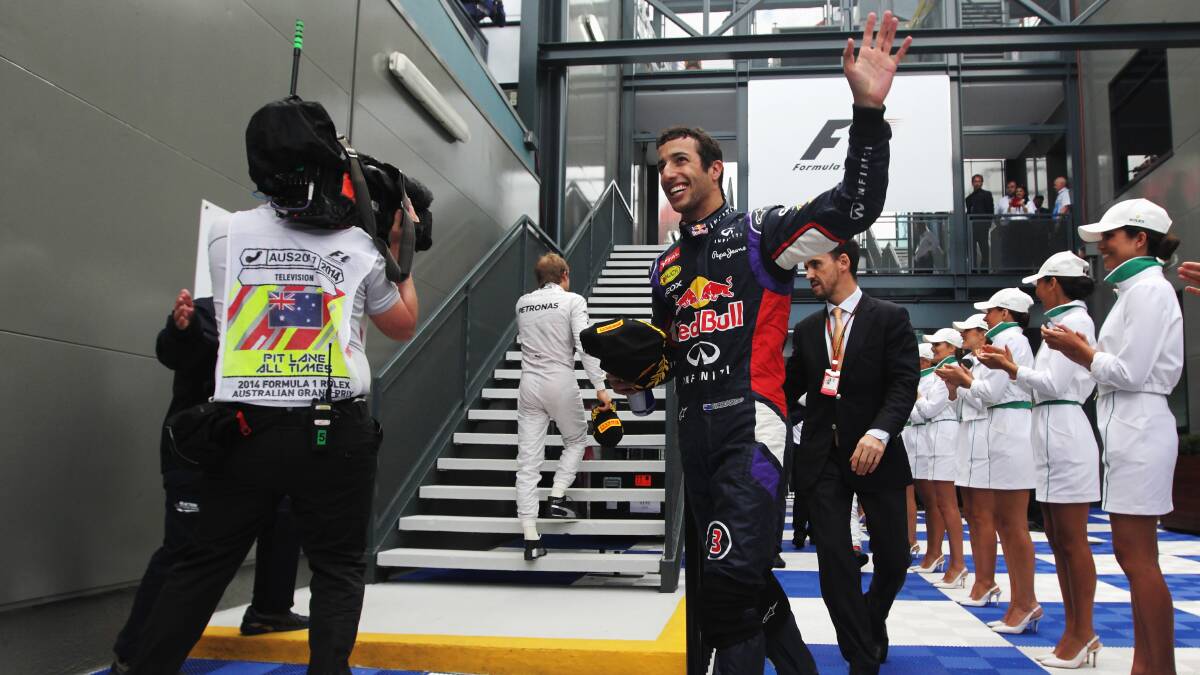 Daniel Ricciardo of Australia and Infiniti Red Bull Racing celebrates as he makes his way to the podium. PHOTOS: GETTY IMAGES