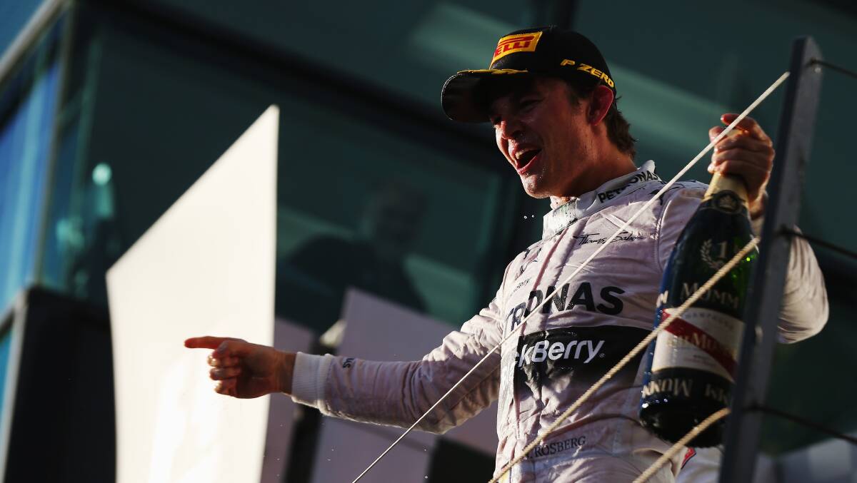 Nico Rosberg of Germany and Mercedes GP celebrates on the podium after winning the Australian Formula One Grand Prix. PHOTOS: GETTY IMAGES