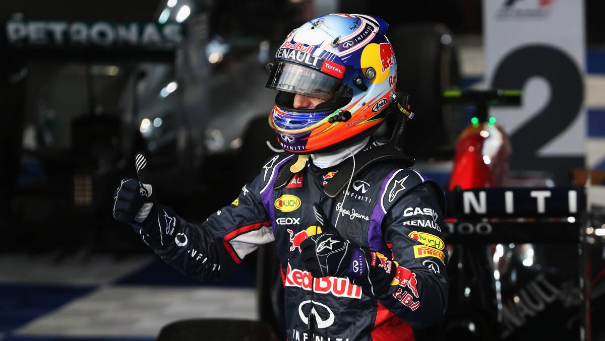  Daniel Ricciardo of Australia and Infiniti Red Bull Racing celebrates in parc ferme after finishing second. PHOTOS: GETTY IMAGES