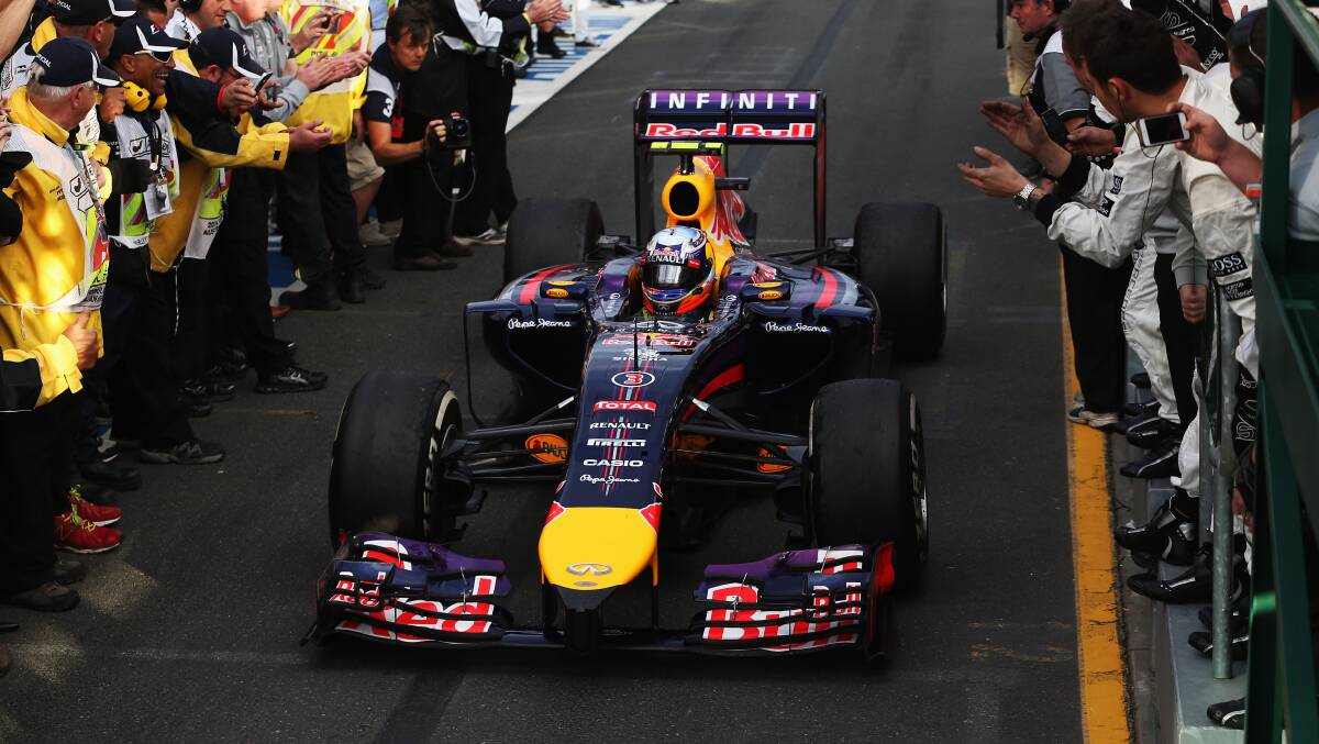 Daniel Ricciardo of Australia and Infiniti Red Bull Racing celebrates as he drives into parc ferme after finishing second during the Australian Formula One Grand Prix. PHOTOS: GETTY IMAGES