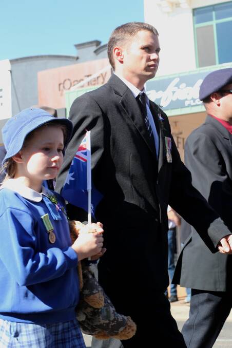 Anzac Day 2014 Banna Ave Griffith, Chris Potroz with his daughter Maddison 9.