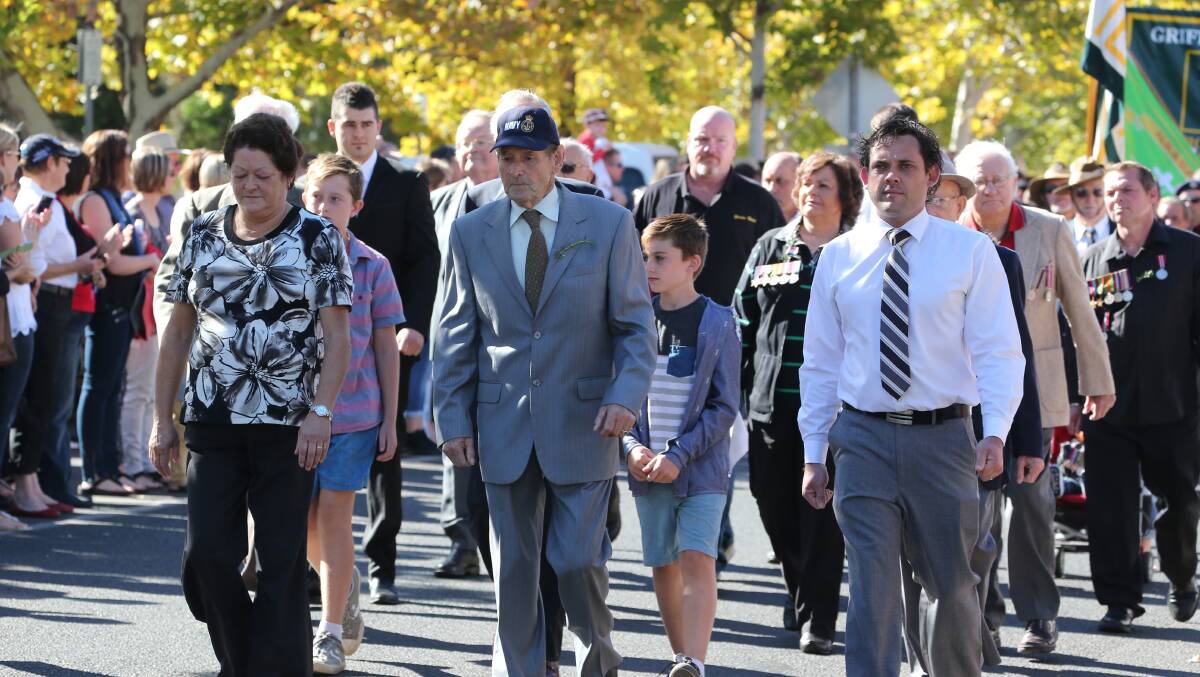 Anzac Day 2014 Banna Ave Griffith,  Norman Colborne who served in the English and Australian Navy with his daughter Sandra Jonas and grandson Scott Rudkin.