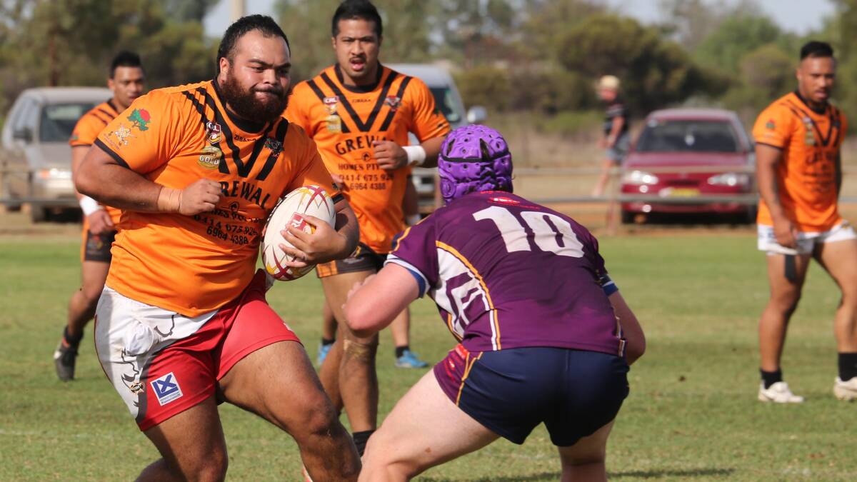 CANNONBALL: Waratahs prop Michael Ioapo prepares to steamroll a Bidgee Hurricanes player in the Paul Kelly Memorial Shield earlier this year. 