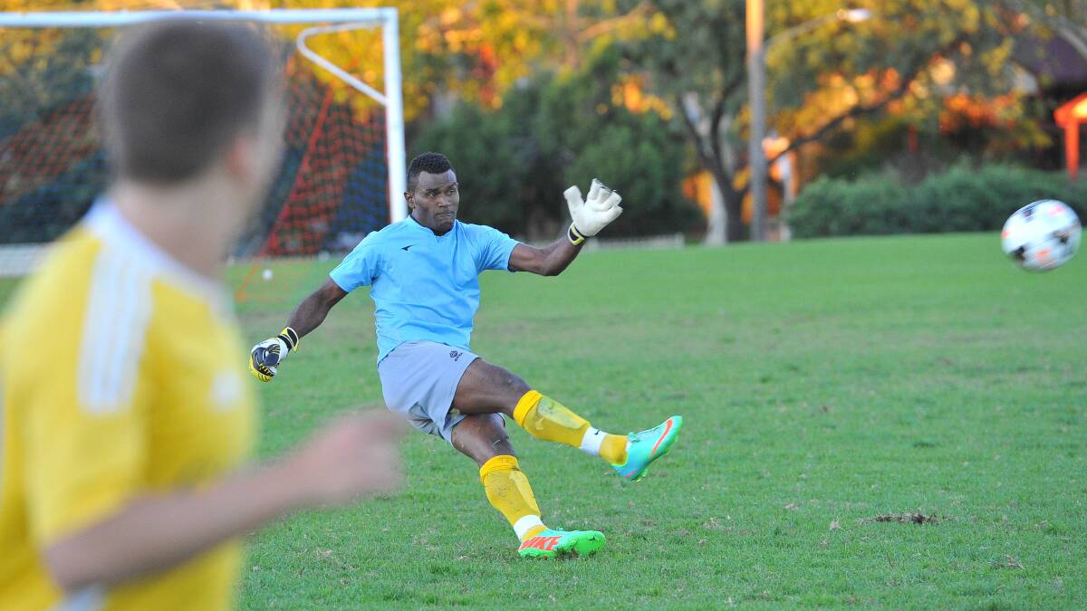 IN THE CLEAR: YFC goalkeeper and Fiji international Jone Ralulu hoofs the ball up the park against the Eastern Wanderers last weekend.