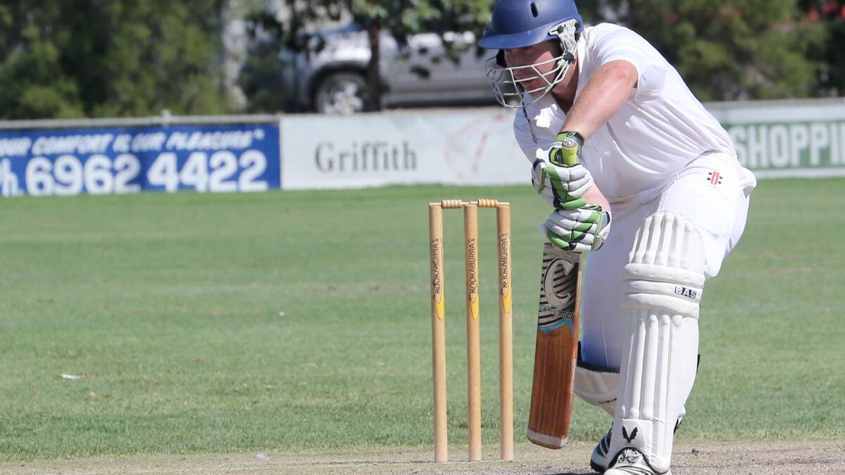 TAKE IT EASY: Exies' Phil Burge takes a safety-first approach early in the second innings of the preliminary final against Leagues Club on Sunday.