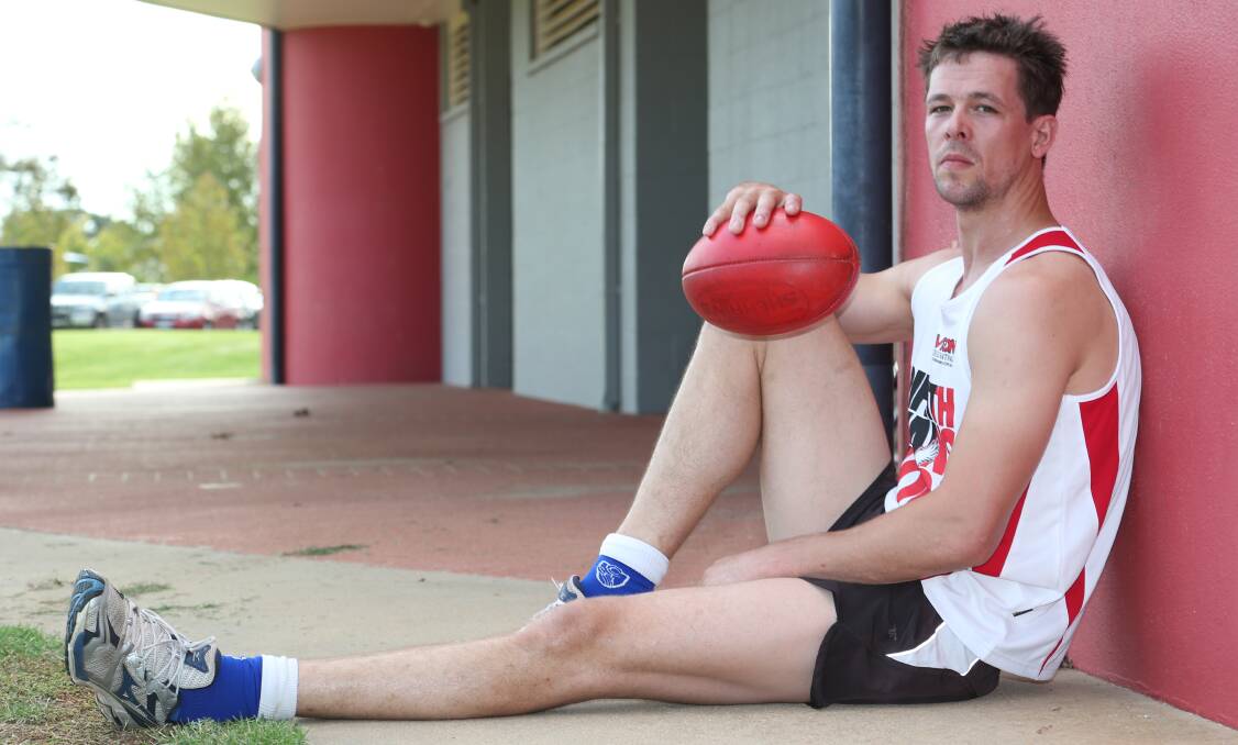TALL TIMBER: The Swans' ruck headaches are over after unveiling the signing of former SANFL and WAFL big man Michael Griffiths, who stands at a towering 206cm.